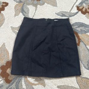 Black fitted mini skirt